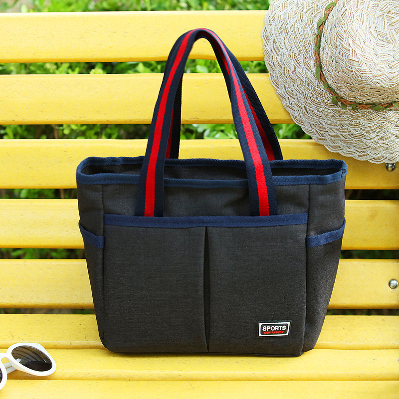 Wholesale canvas handbags, women's large-capacity multi-layer hand-held bags, casual travel bags, mommy bags and women's bags details Picture