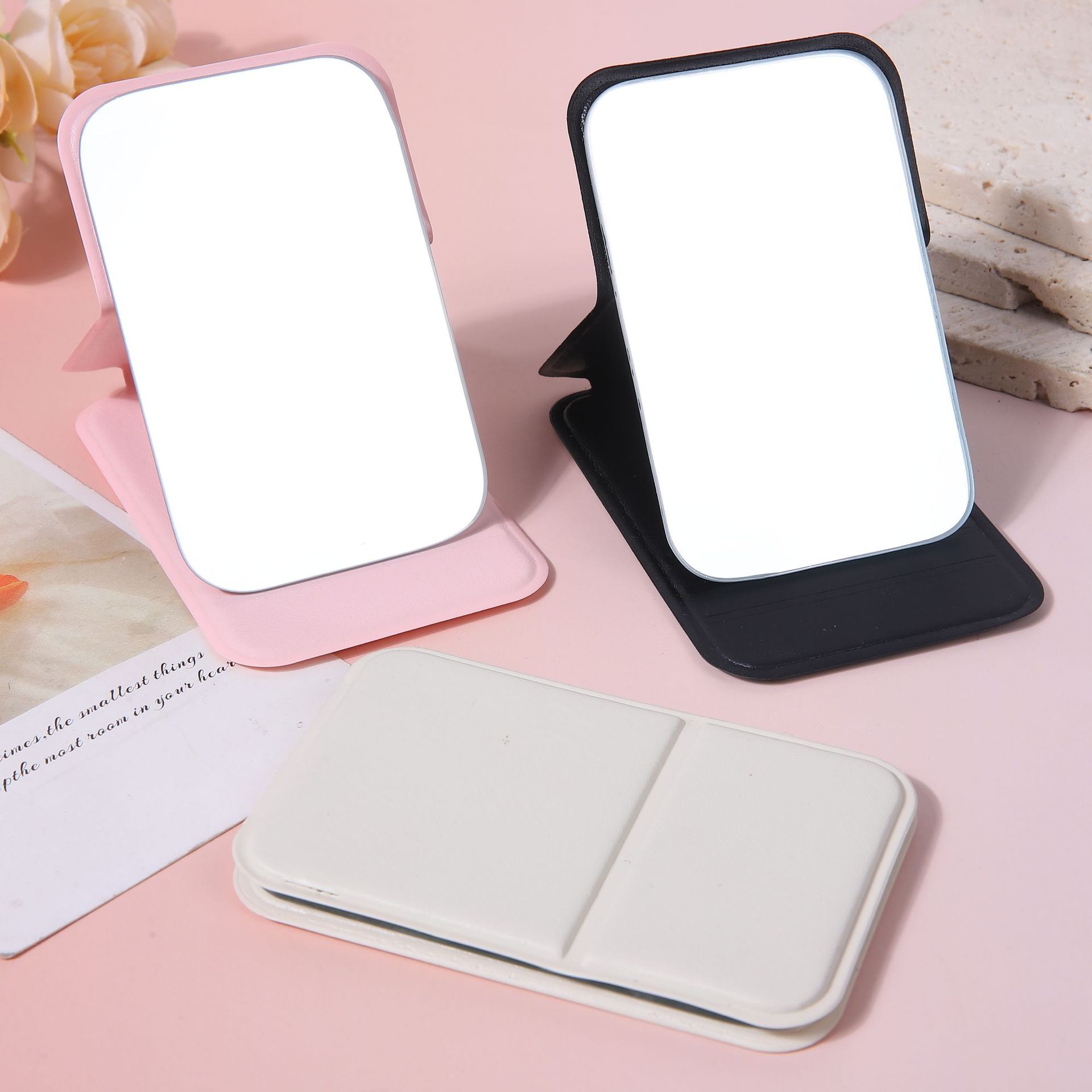 A portable small mirror for women, a simple desktop that can stand upright, ultra-mini student portable women's dressing and folding touch-up mirror details Picture