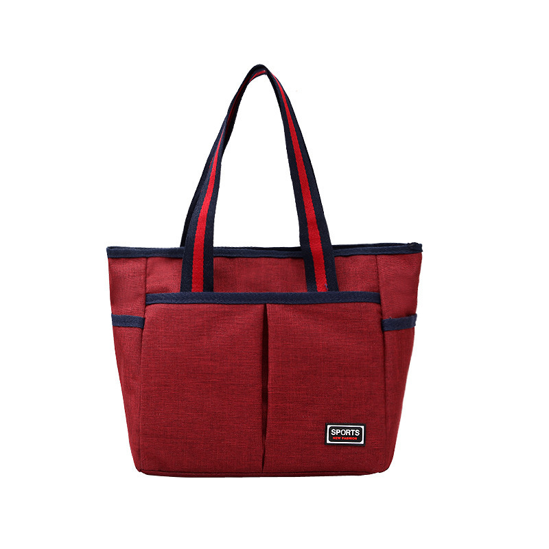 Wholesale canvas handbags, women's large-capacity multi-layer hand-held bags, casual travel bags, mommy bags and women's bags undefined