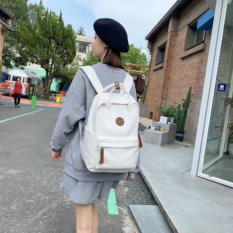 Japanese-style ins girl backpack, Korean-style junior high school student schoolbag, large-capacity solid-color nylon hand-held backpack for trendy girls details Picture