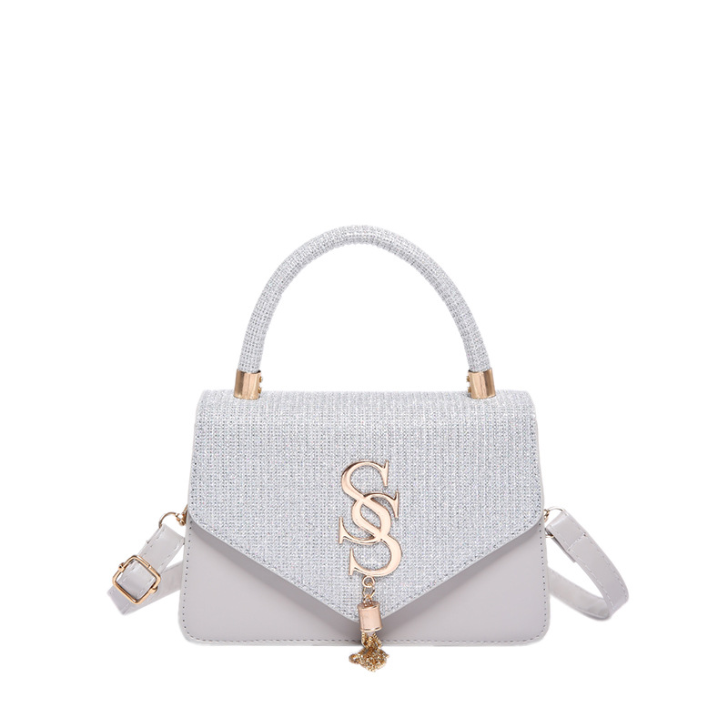 A niche quality single-shoulder bag for women, a new Spring/Summer 2024 ins minimalist and trendy fringed hand-held commuter crossbody bag undefined