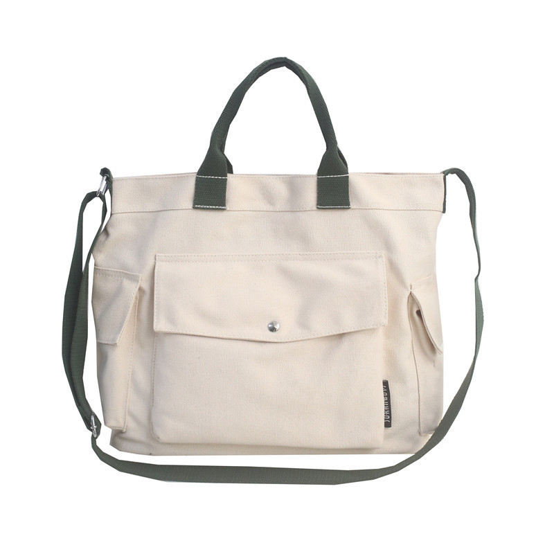 A new style of Hong Kong-style retro casual large-capacity tote canvas bag, fashionable and trendy, simple and versatile single-shoulder crossbody bag Item Picture