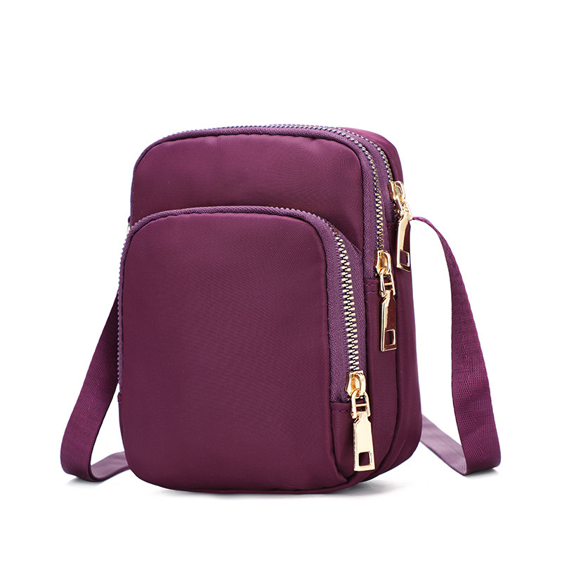 A 2022 new trendy and versatile women's bag made of Oxford fabric, a lightweight single-shoulder crossbody bag with loose change, a mobile phone bag and a mini bag undefined