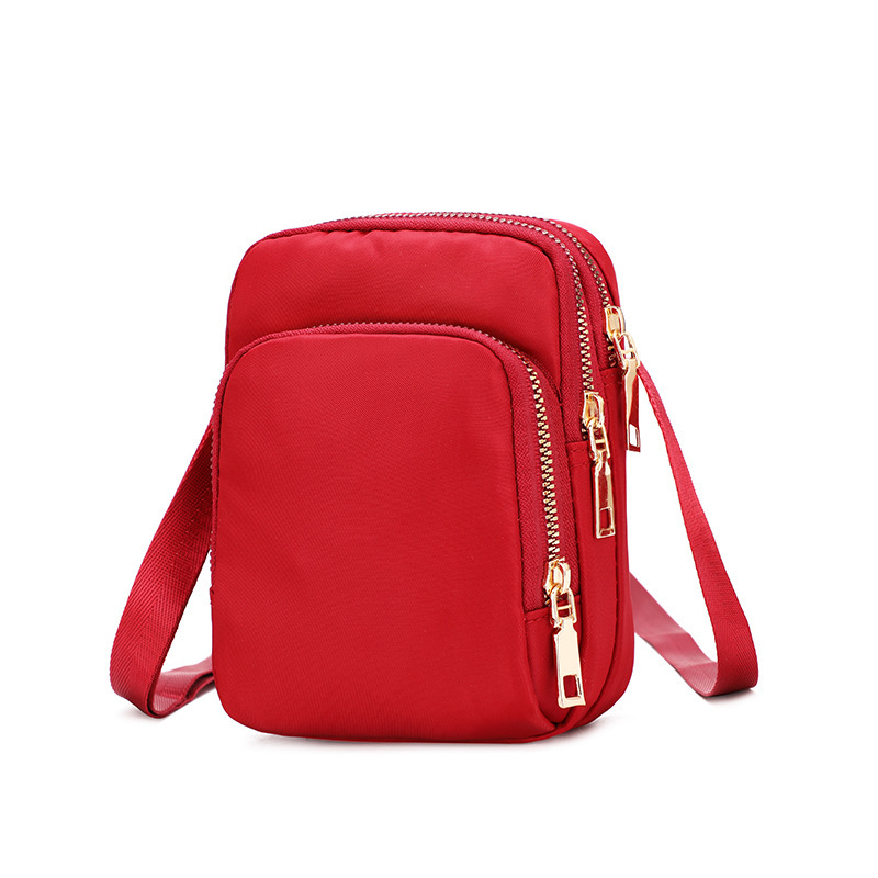 A 2022 new trendy and versatile women's bag made of Oxford fabric, a lightweight single-shoulder crossbody bag with loose change, a mobile phone bag and a mini bag details Picture