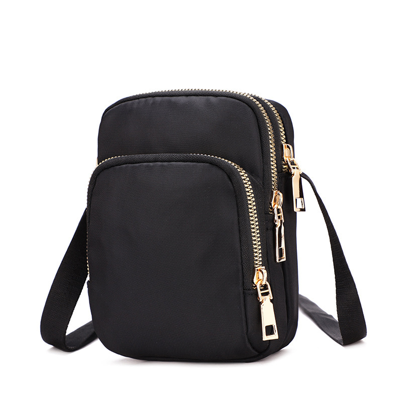 A 2022 new trendy and versatile women's bag made of Oxford fabric, a lightweight single-shoulder crossbody bag with loose change, a mobile phone bag and a mini bag undefined