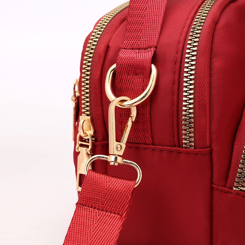 Wholesale of 2022 new women's casual single-shoulder mobile phone bags, lightweight crossbody bags, loose change hand-held shell small bags Specification image