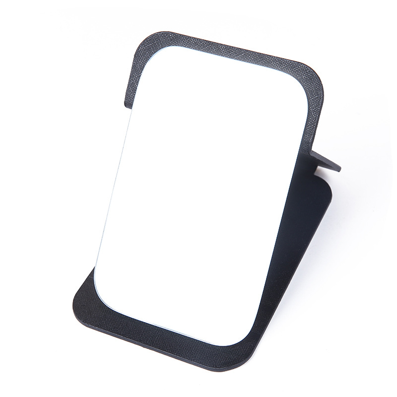 A portable small mirror for women, a simple desktop that can stand upright, ultra-mini student portable women's dressing and folding touch-up mirror Item Picture