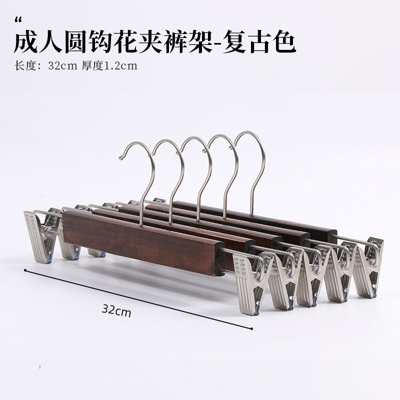 Rotating solid wood clothes hanger, home clothes hanging rack, anti-slip and traceless storage, special clothes drying rack for clothing stores and hotels undefined