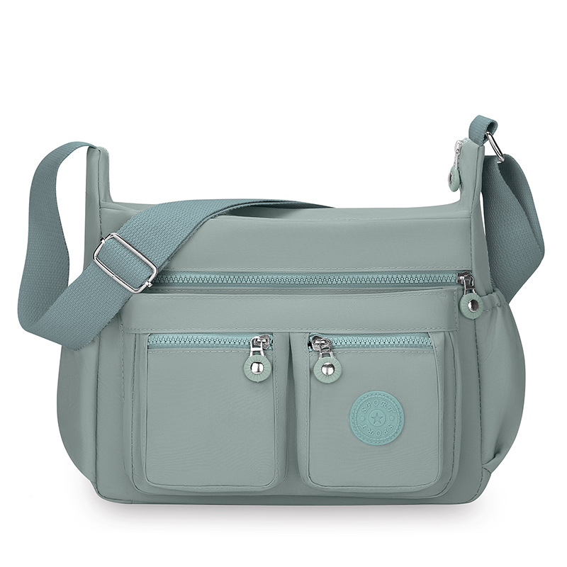 Wholesale of best-selling water-washed fabric women's bags, large-capacity multi-compartment crossbody bags for cross-border middle-aged and elderly mothers undefined
