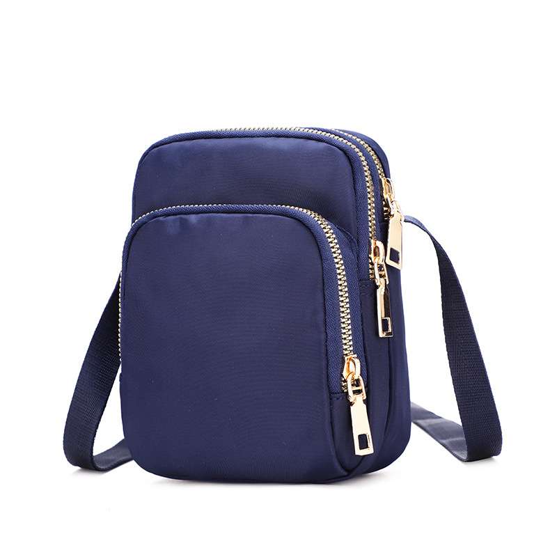 A 2022 new trendy and versatile women's bag made of Oxford fabric, a lightweight single-shoulder crossbody bag with loose change, a mobile phone bag and a mini bag undefined