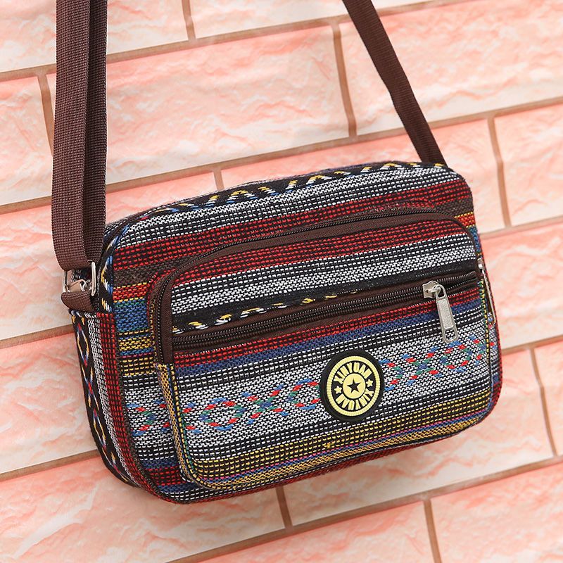Ethnic style women's bag manufacturer wholesale new fashionable canvas crossbody bags for middle-aged and elderly people with multiple compartments and large capacity single-shoulder bags undefined