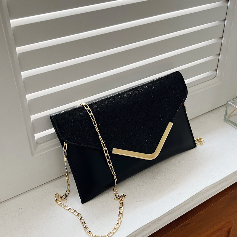 A new cross-border European and American fashion and shiny evening bag with V-shaped sequins, a clutch and chain single-shoulder crossbody bag