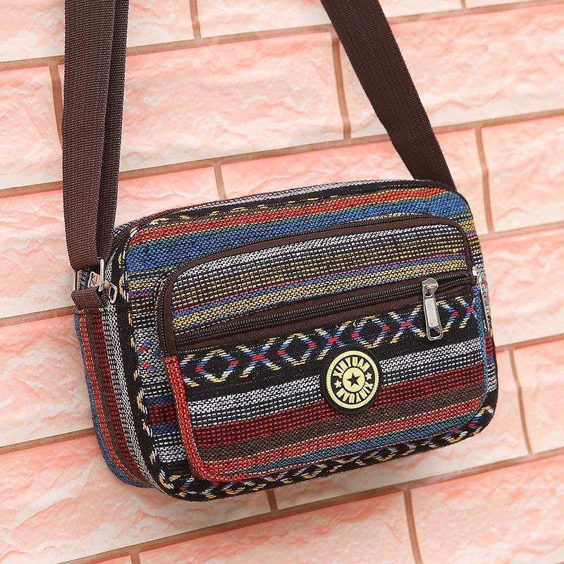 Ethnic style women's bag manufacturer wholesale new fashionable canvas crossbody bags for middle-aged and elderly people with multiple compartments and large capacity single-shoulder bags undefined