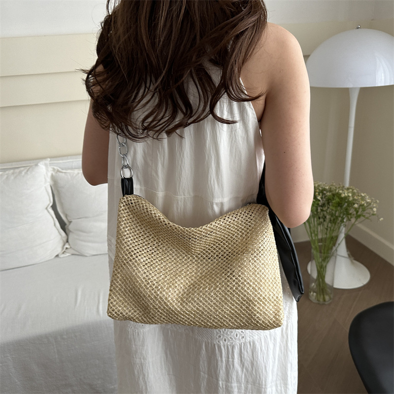 A new 2024 trendy casual straw woven forest-themed beach ins tote bag with a large capacity details Picture