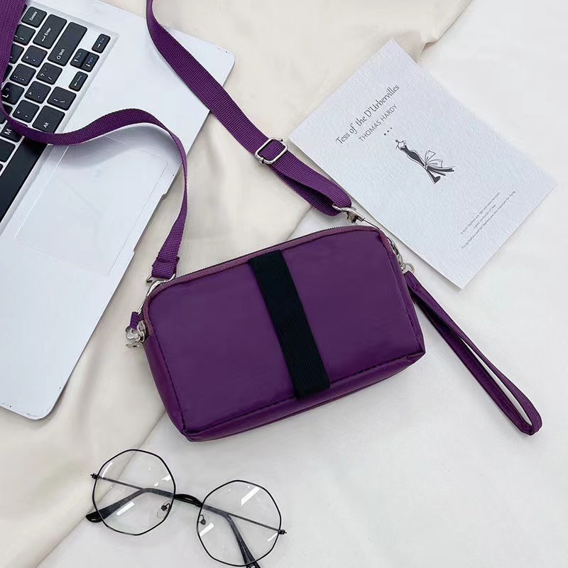 Three-layer zipper handbag for women, Oxford waterproof key storage bag, single-shoulder crossbody small square bag, casual and versatile Application Scenario