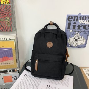 Japanese-style ins girl backpack, Korean-style junior high school student schoolbag, large-capacity solid-color nylon hand-held backpack for trendy girls undefined