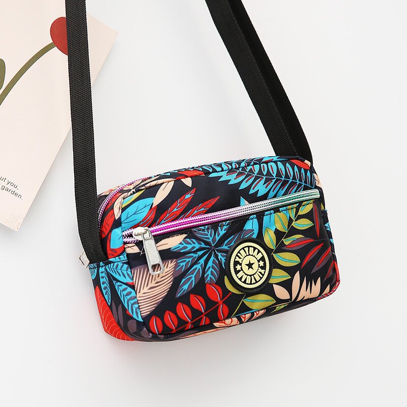 Wholesale of new bags: Women's Oxford cloth single-shoulder crossbody bags, middle-aged and elderly floral cloth small bags, loose change mobile phone bags, and street stall bags undefined