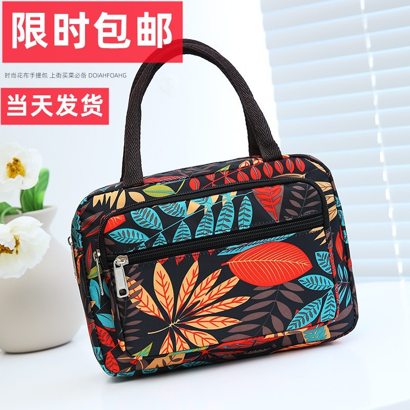 Manufacturer wholesale mom flower cloth bags, large-capacity handbags, lightweight, and popular women's bags for night market stalls details Picture