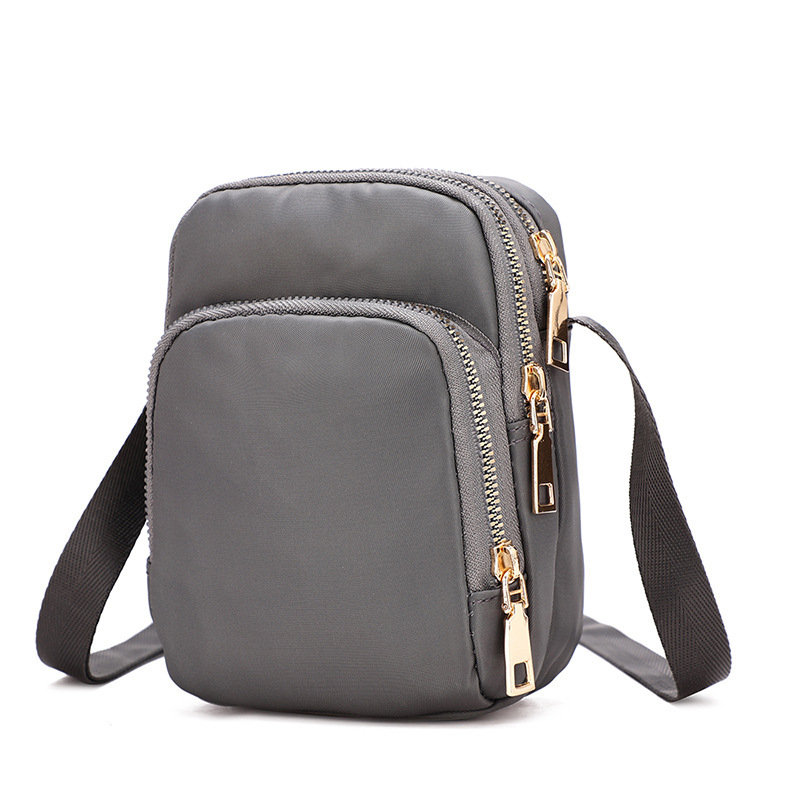 A 2022 new trendy and versatile women's bag made of Oxford fabric, a lightweight single-shoulder crossbody bag with loose change, a mobile phone bag and a mini bag undefined