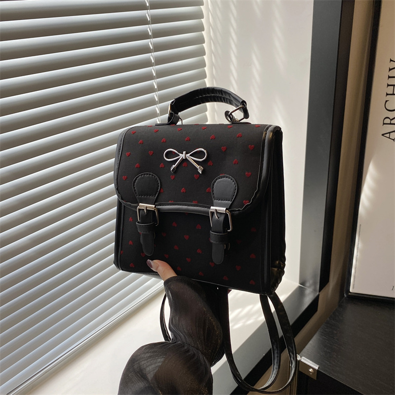 Simple and lightweight student backpack, women's casual and fashionable handbag, 2024 autumn new polka dot bow crossbody bag