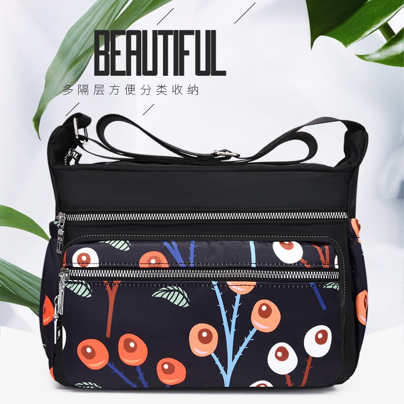 New mom bag, nylon fabric, women's printed single-shoulder crossbody bag, large-capacity canvas bag, middle-aged and elderly travel backpack details Picture