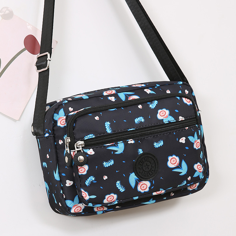 This is a popular water-washable fabric single-shoulder bag for women, middle-aged and elderly people. It is a light and casual bag for shopping and grocery shopping undefined