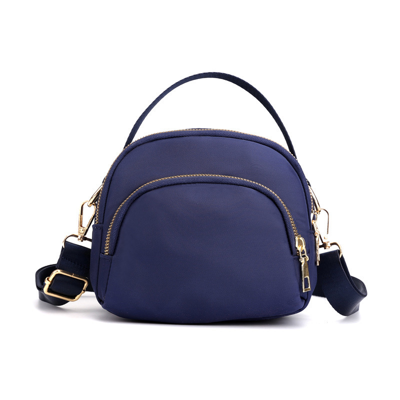 Wholesale of 2022 new women's casual single-shoulder mobile phone bags, lightweight crossbody bags, loose change hand-held shell small bags undefined