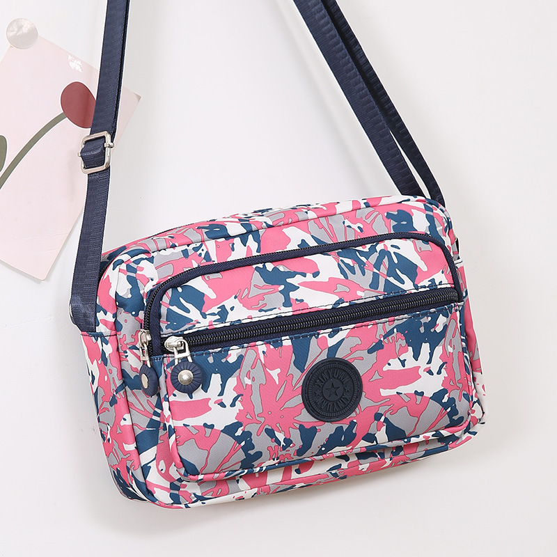 This is a popular water-washable fabric single-shoulder bag for women, middle-aged and elderly people. It is a light and casual bag for shopping and grocery shopping full image