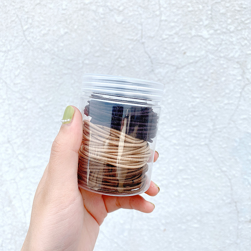 The hair tie is a simple and elegant style for women in Instagram. It's a cute Korean-style colorful leather case. 2022 new style for tying hair and using hair bands in Instagram style undefined