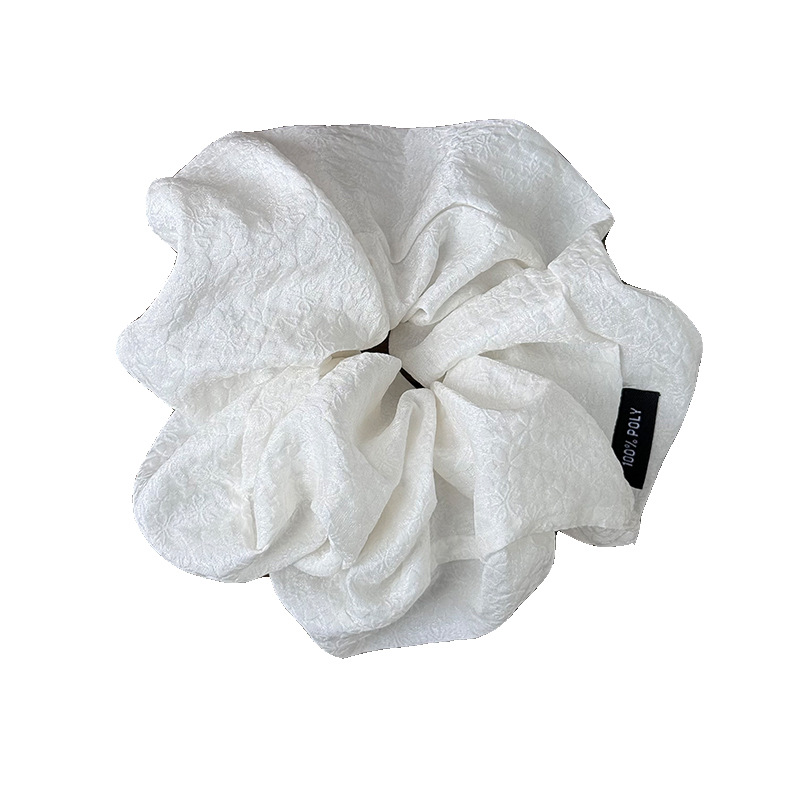 The energetic forest-themed solid color printed textured large intestine hair band is a versatile and refreshing bun hair band for girls going out Item Picture