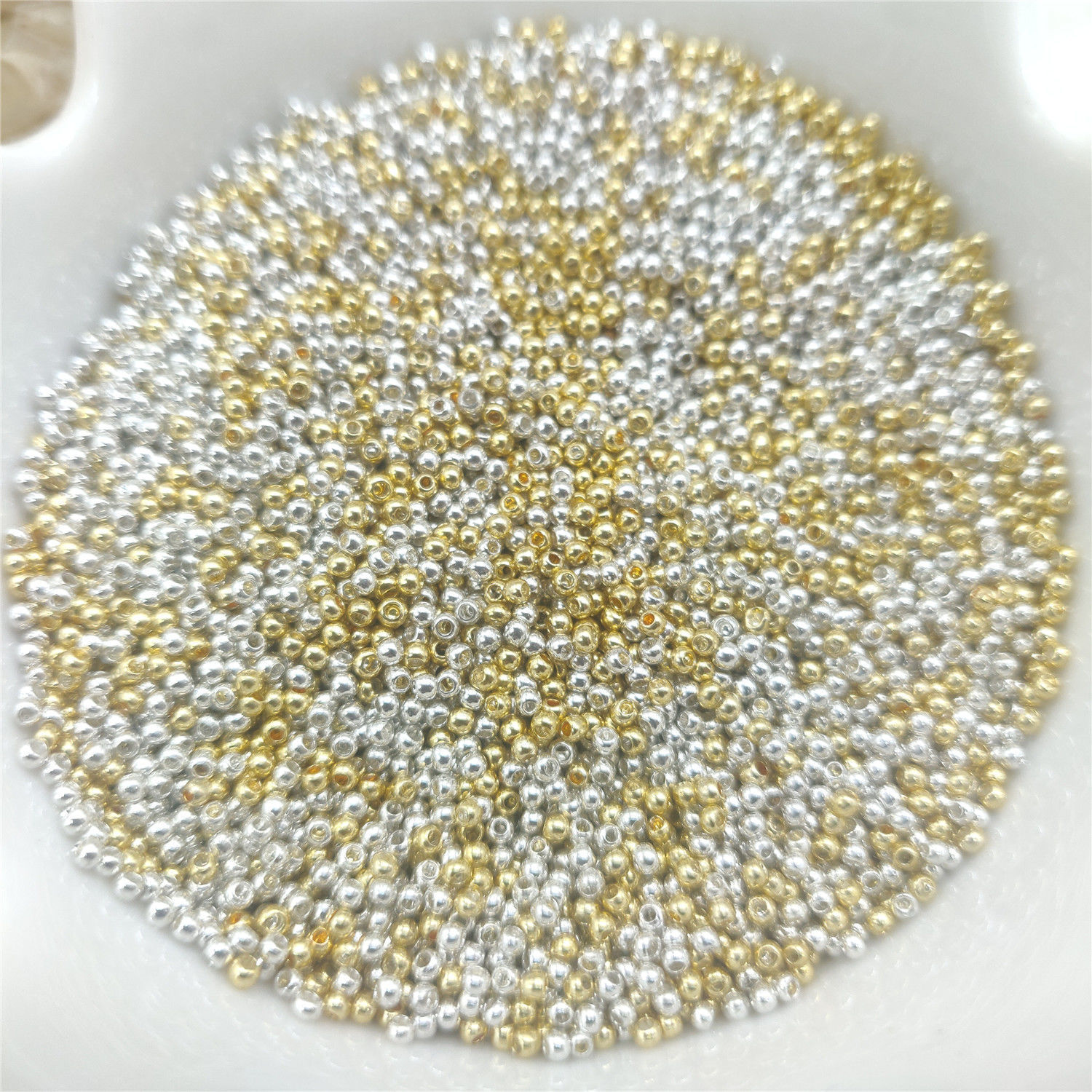 Wholesale of color-preserving metal spacer beads, loose beads, gold-plated beads, handcrafted diy beads, material accessories, large-hole straight-hole round beads undefined