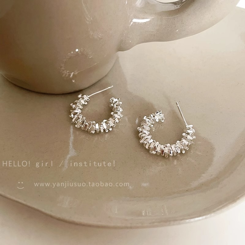 The C-shaped silver earrings for women feature a unique French design with a cold style. The stud earrings exude a sense of sophistication and elegance undefined