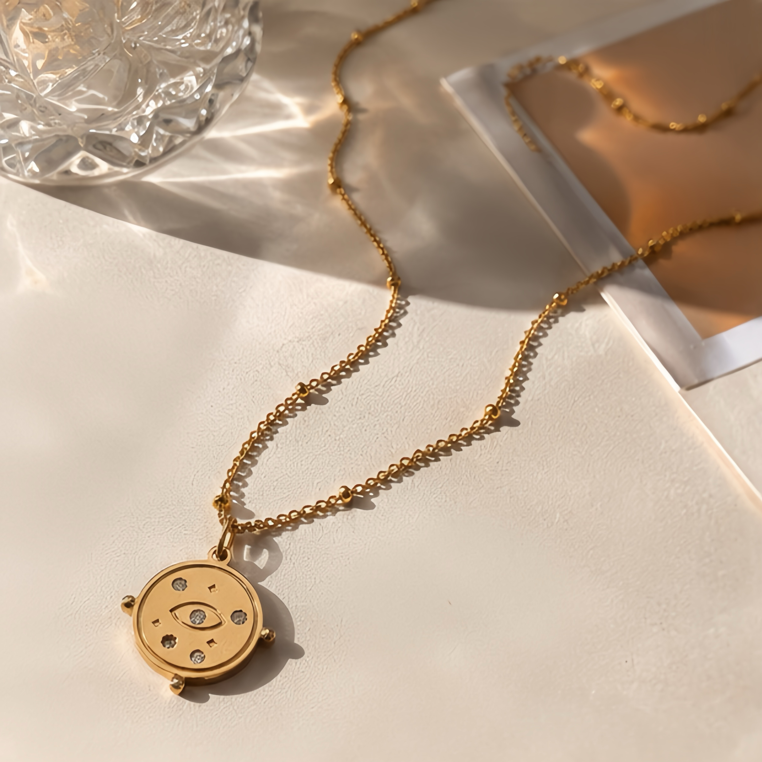 This multi-diamond embellished, all-seeing eye relief stainless steel necklace features a unique and mysterious style, a retro exotic look, and a unisex look. It's a versatile gift chain for collarbones Application Scenario