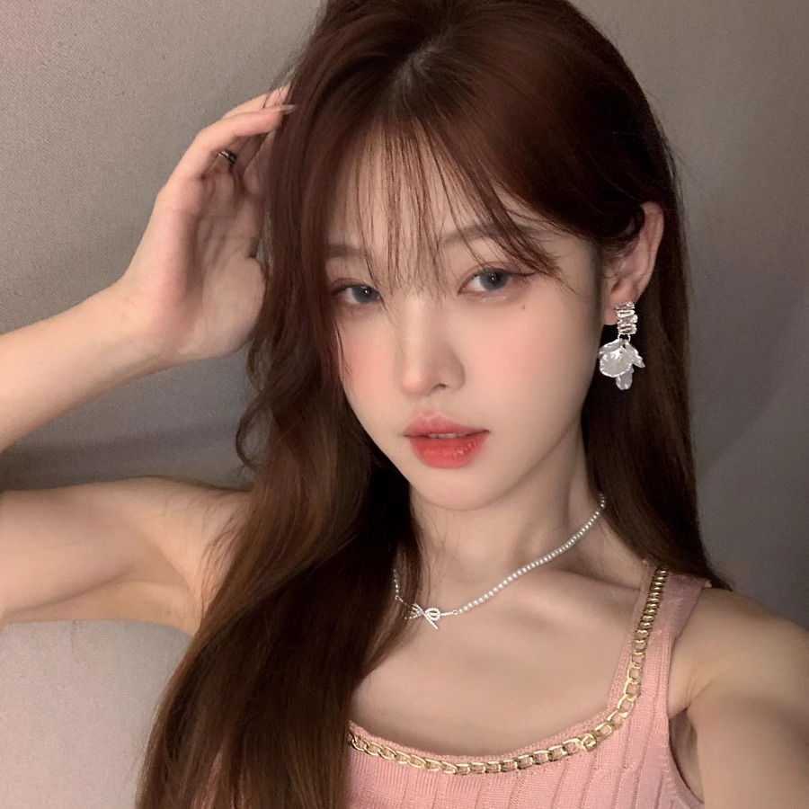 Light luxury and high-end earrings, women's niche design, fashionable petal tassel stud earrings, retro simple and individual ear clips and earrings Application Scenario