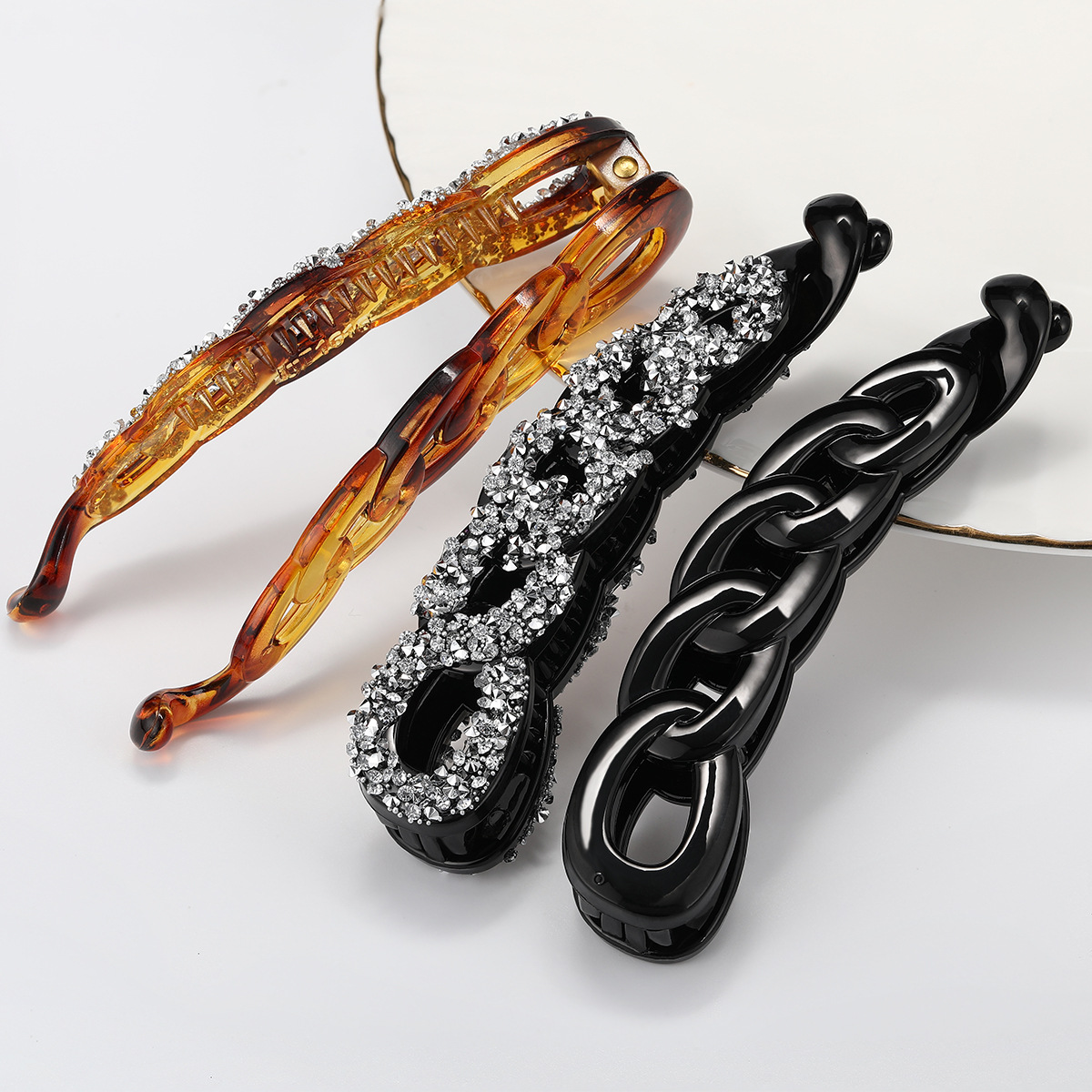 Cross-border best-selling hollowed-out chain banana hair clip PC material 10.6cm large lady's hair clip DIY Specification image