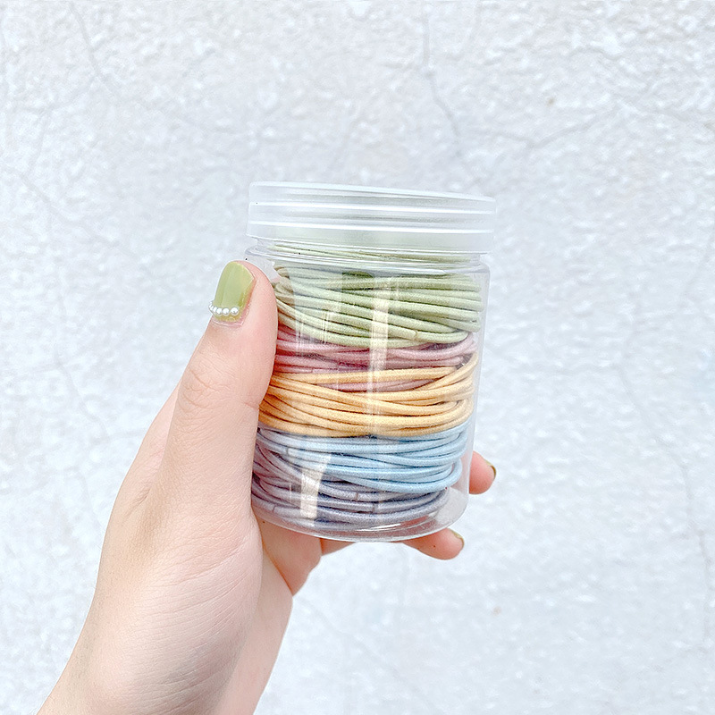 The hair tie is a simple and elegant style for women in Instagram. It's a cute Korean-style colorful leather case. 2022 new style for tying hair and using hair bands in Instagram style undefined