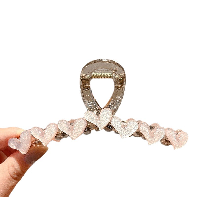 Simple jelly heart-shaped hairpin at the back of a woman's head, exuding a high-end and elegant charm. Shark clip, semi-tied hair accessory, hairpin Item Picture