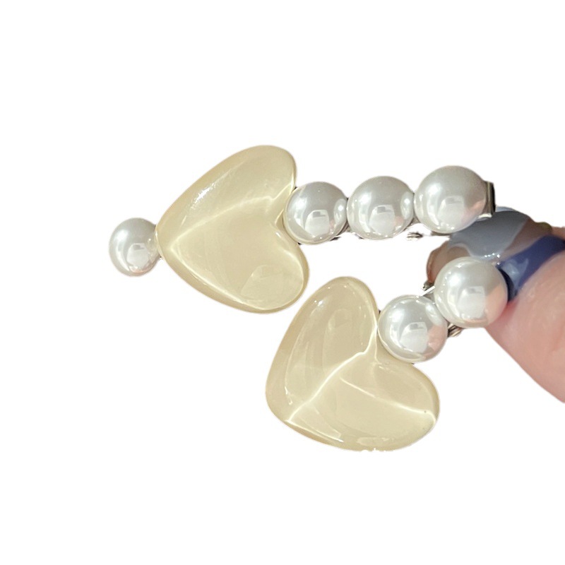 Mermaid Bubble Super Fairy French Wave Light heart-shaped Pearl hair clip, high-end, niche, sweet and elegant fringe by the sea clip Item Picture