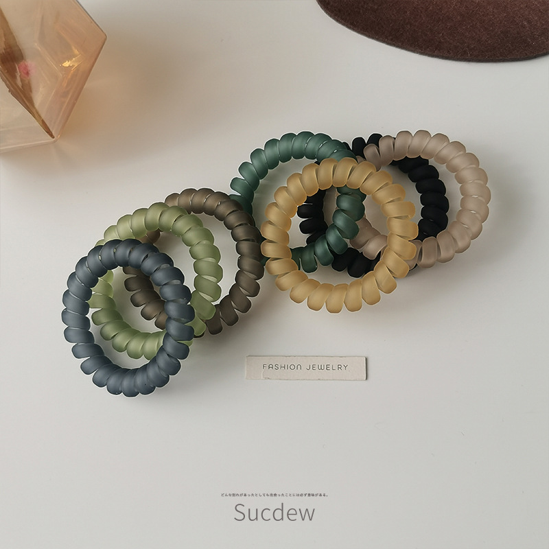 The transparent matte telephone line hair tie is simple, durable and highly elastic. It is a women's hair tie that won't damage the hair. It is a ponytail hair tie Specification image