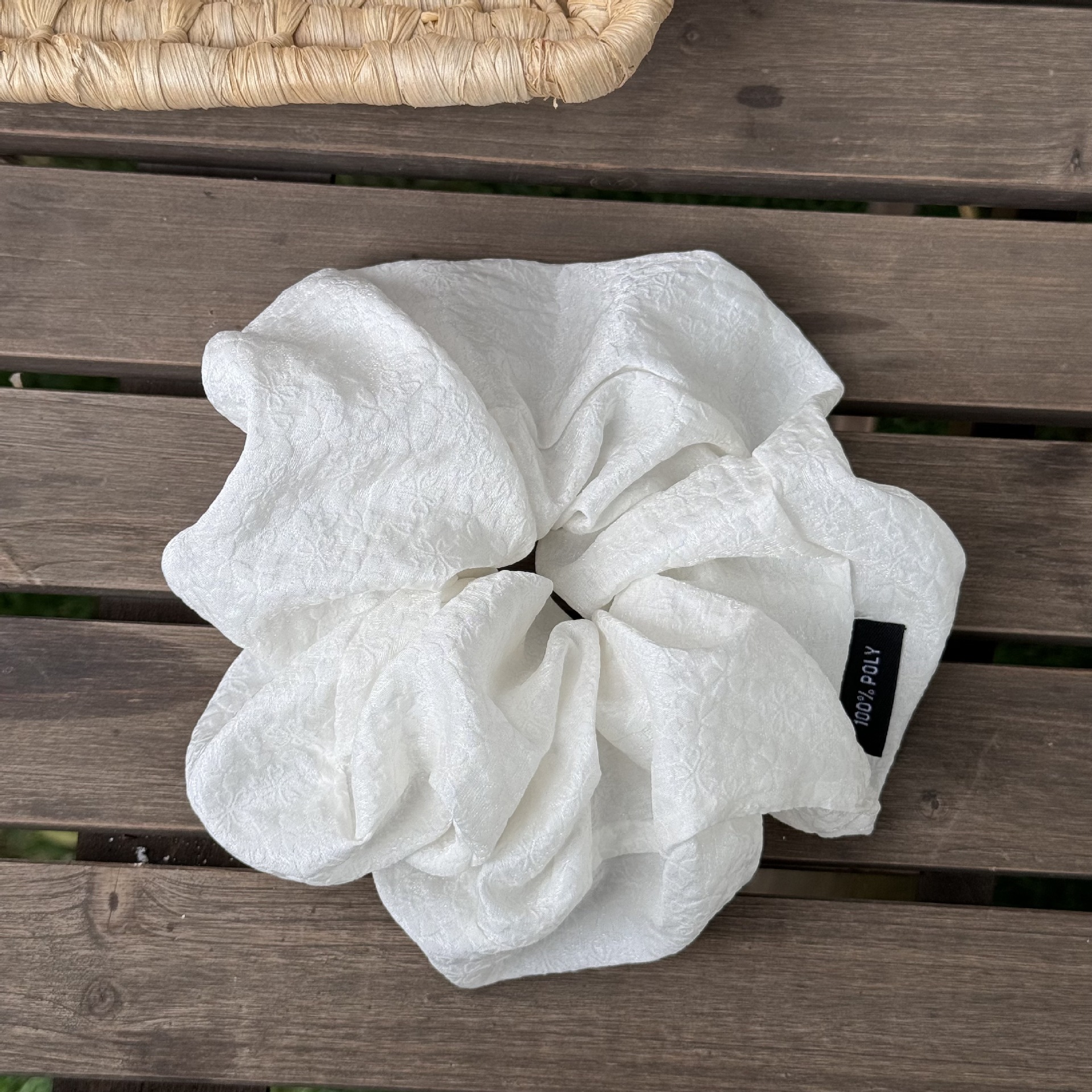The energetic forest-themed solid color printed textured large intestine hair band is a versatile and refreshing bun hair band for girls going out undefined