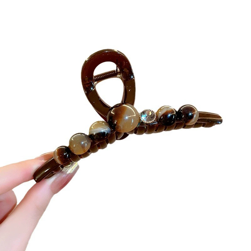 The new 2025 version of the "Elegant and luxurious, round bead, high-end" hairpin for women has a large amount of hair and a shark clip at the back of the head Item Picture