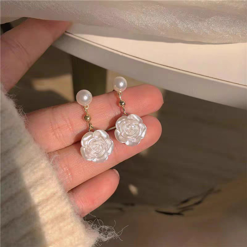 Zirconium rose flower earrings with a light luxury and high-end feel, stud earrings, a 2026 bestseller for women, are versatile and niche earrings for summer commutes undefined