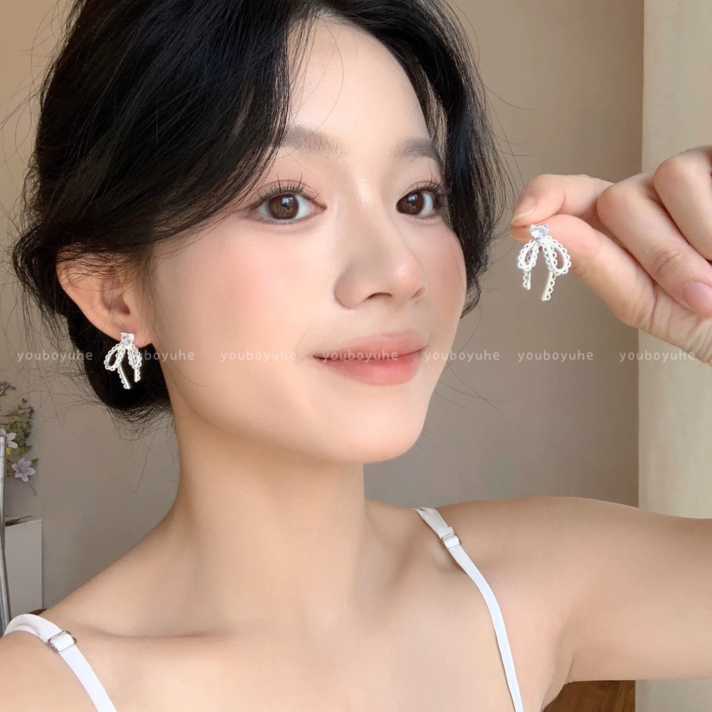 Zirconium rose flower earrings with a light luxury and high-end feel, stud earrings, a 2026 bestseller for women, are versatile and niche earrings for summer commutes undefined