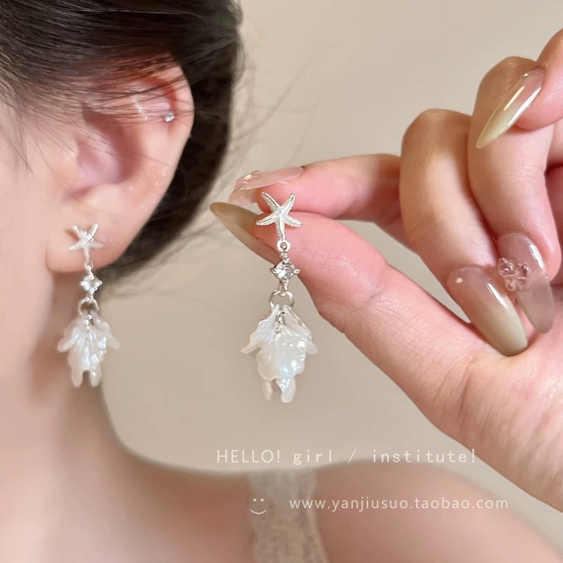 Zirconium rose flower earrings with a light luxury and high-end feel, stud earrings, a 2026 bestseller for women, are versatile and niche earrings for summer commutes undefined