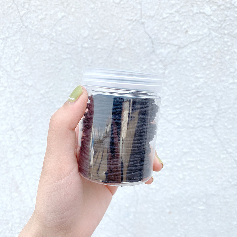 The hair tie is a simple and elegant style for women in Instagram. It's a cute Korean-style colorful leather case. 2022 new style for tying hair and using hair bands in Instagram style undefined