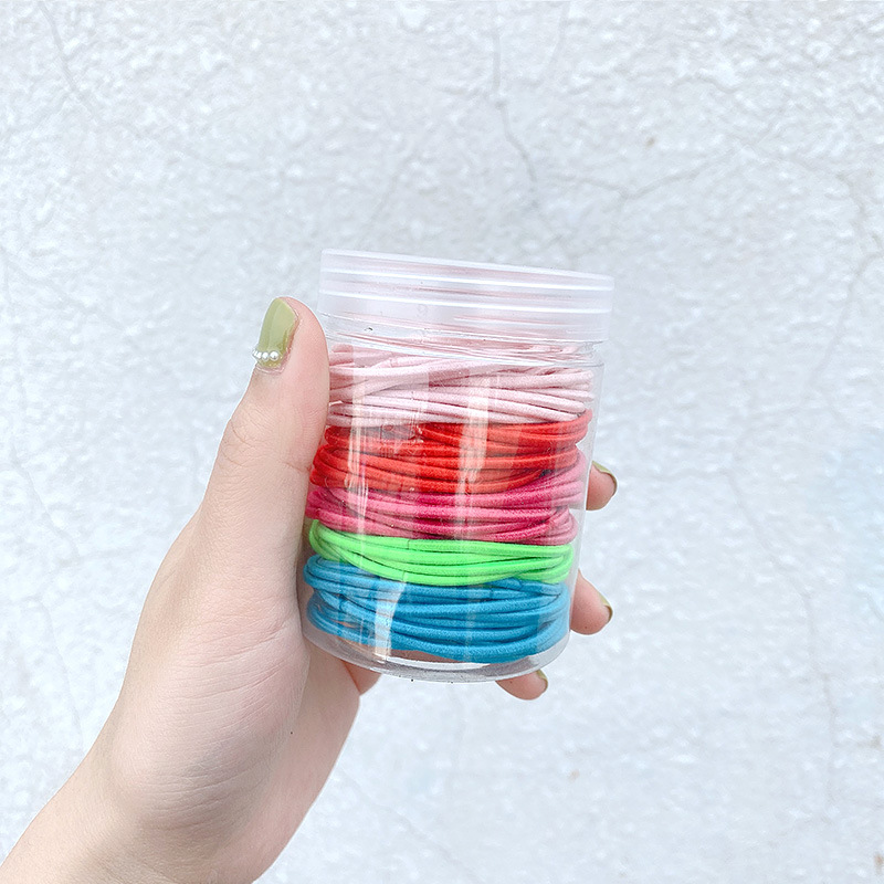 The hair tie is a simple and elegant style for women in Instagram. It's a cute Korean-style colorful leather case. 2022 new style for tying hair and using hair bands in Instagram style undefined