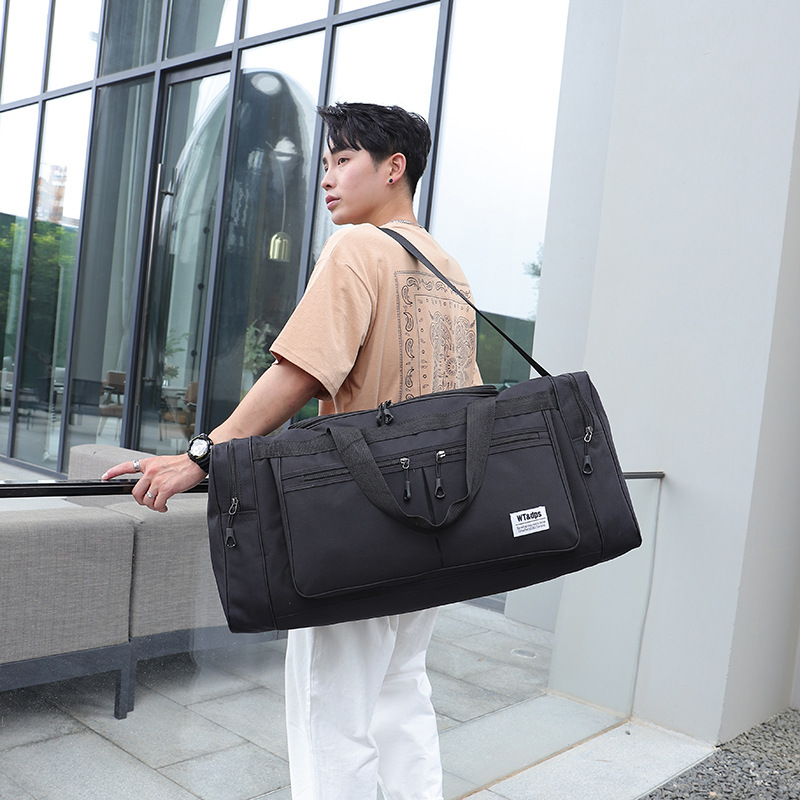 A simple, foldable, large-capacity, lightweight hand-held travel bag for men and a clothing bag for women details Picture