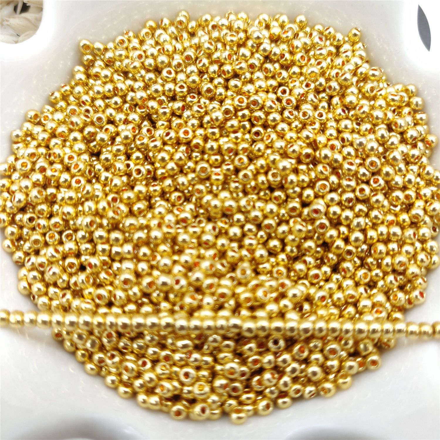 Wholesale of color-preserving metal spacer beads, loose beads, gold-plated beads, handcrafted diy beads, material accessories, large-hole straight-hole round beads undefined