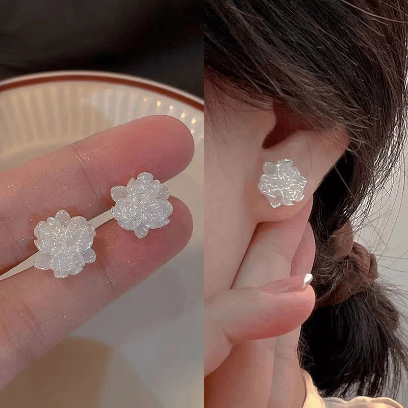 Zirconium rose flower earrings with a light luxury and high-end feel, stud earrings, a 2026 bestseller for women, are versatile and niche earrings for summer commutes undefined