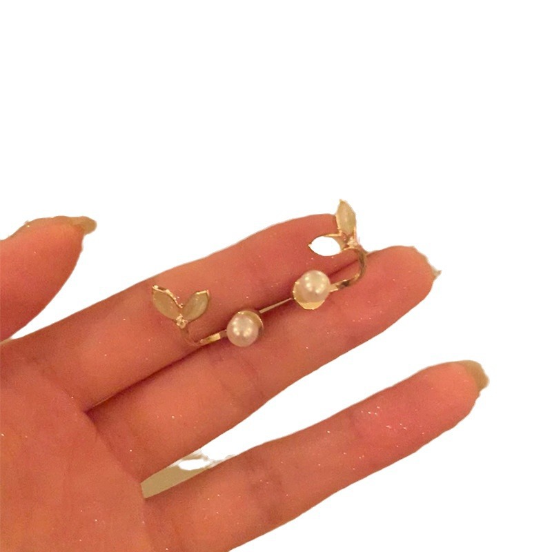 The rear-hanging fishtail pearl earrings for women are a new 2024 high-end style stud earrings with a unique and niche design Item Picture